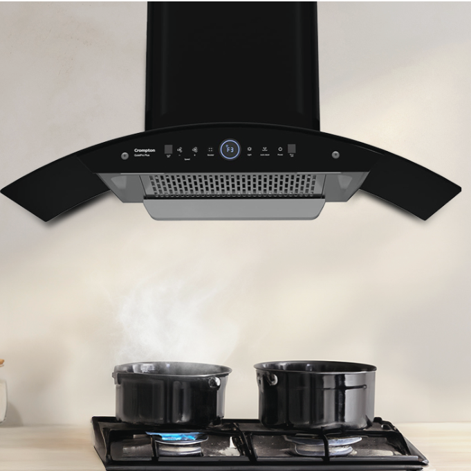 Black chimney hood above a stove with text 'New launches in Chimney' on a light background